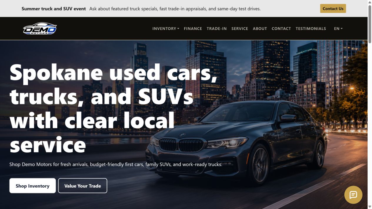 Demo Motors dealer website shown on a laptop